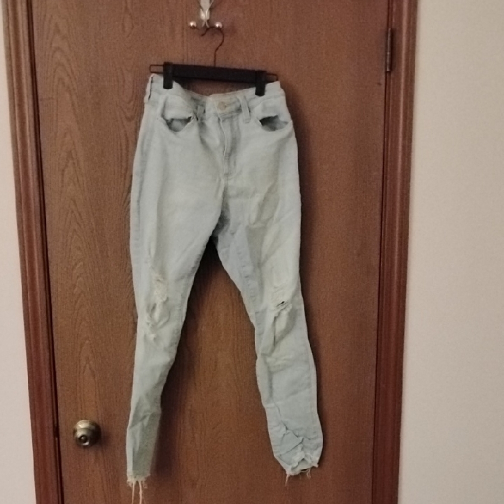 Distressed Light Blue Denim Jeans